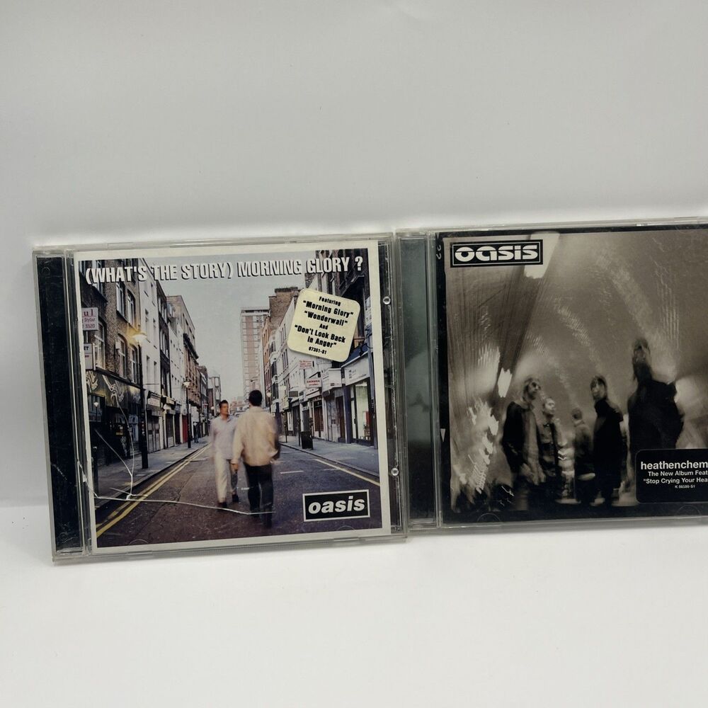 (2) MUSIC CD'S - OASIS One Case Cracked